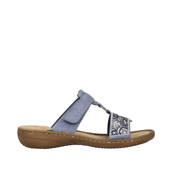 Rieker 608K2-12 women's blue slip-on mules with touch fastening, embellished toe strap, and cushioned sole.