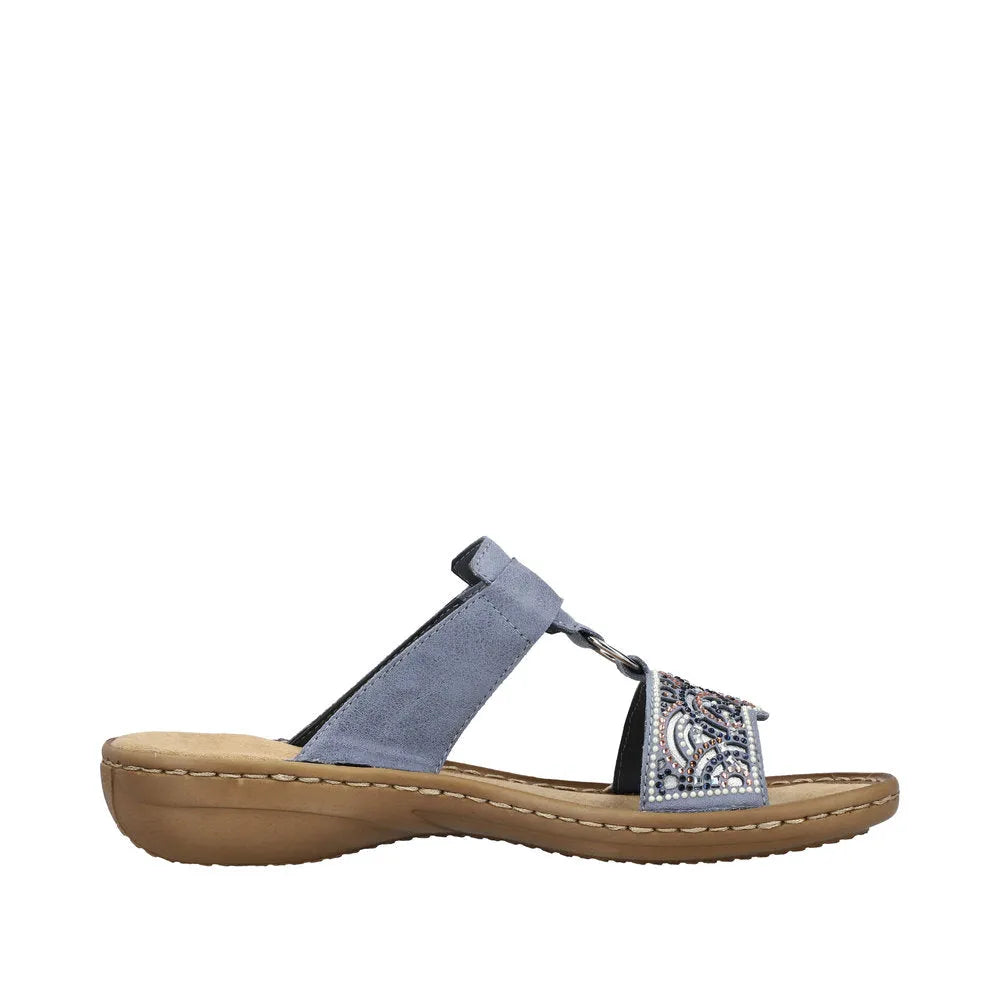 Rieker 608K2-12 ladies blue touch fastening mules with beaded embroidery, cushioned sole, and open-toe design.