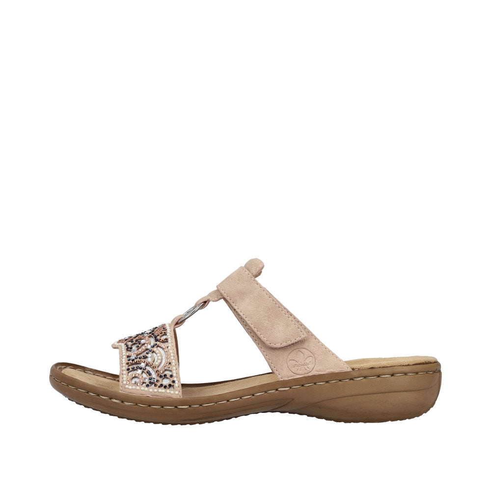 Rieker 608K2-31 women's beige touch fastening mules with embellished front strap and cushioned sole.