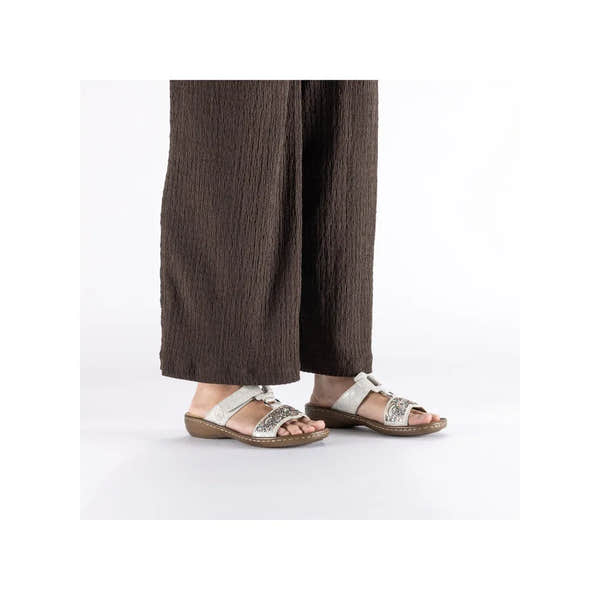 Rieker 608K2-40 ladies silver touch fastening mules with decorative details, open-toe design, and comfortable sole.
