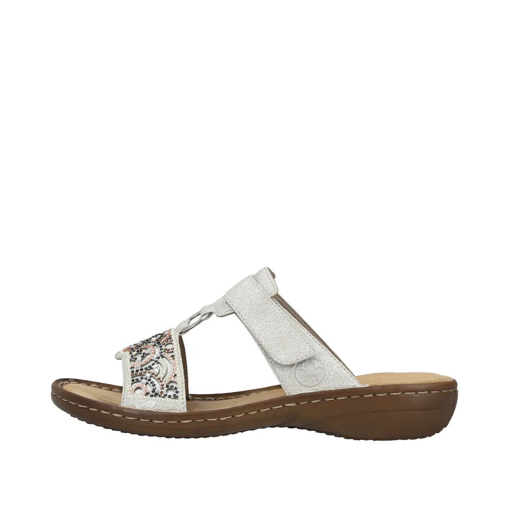 Rieker 608K2-40 women's silver touch fastening mule sandals with decorative embroidery and cushioned sole.