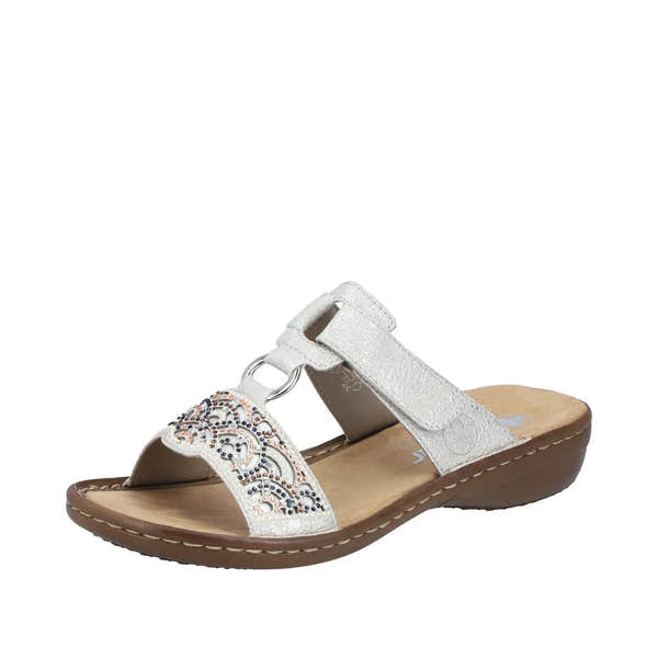 Rieker 608K2-40 women’s silver touch fastening mule sandals with decorative beaded pattern, cushioned insole, and low wedge heel.