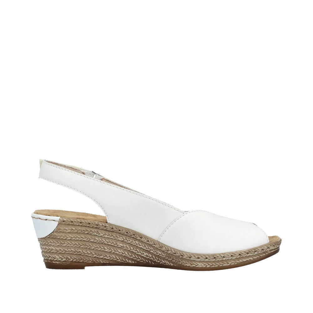 Rieker 62462-80 women's white slingback wedge sandals with cutout design and espadrille-style sole.