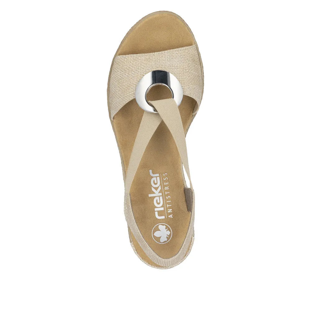 Rieker 624H6-93 women's brown elasticated sandal with metallic ring detail, cushioned insole, and adjustable straps.