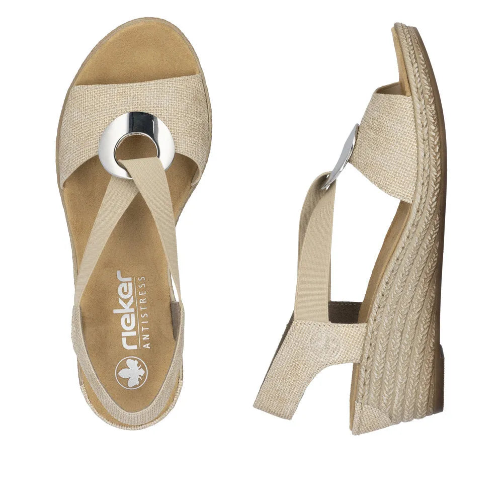 Rieker 624H6-93 women's brown elasticated wedge heel sandals with metallic ring detail and textured platform soles.