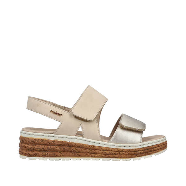 Rieker 62761-90 women's silver and beige leather touch-fastening sandals with layered cork and rubber sole.