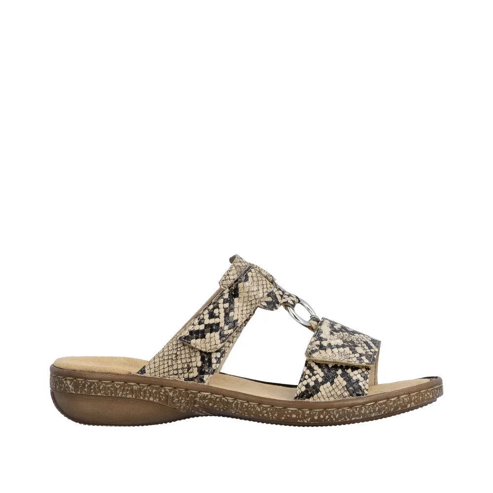 Rieker 628P9-20 women's brown slip-on mule sandals with snake-print straps and comfortable cushioned insole.