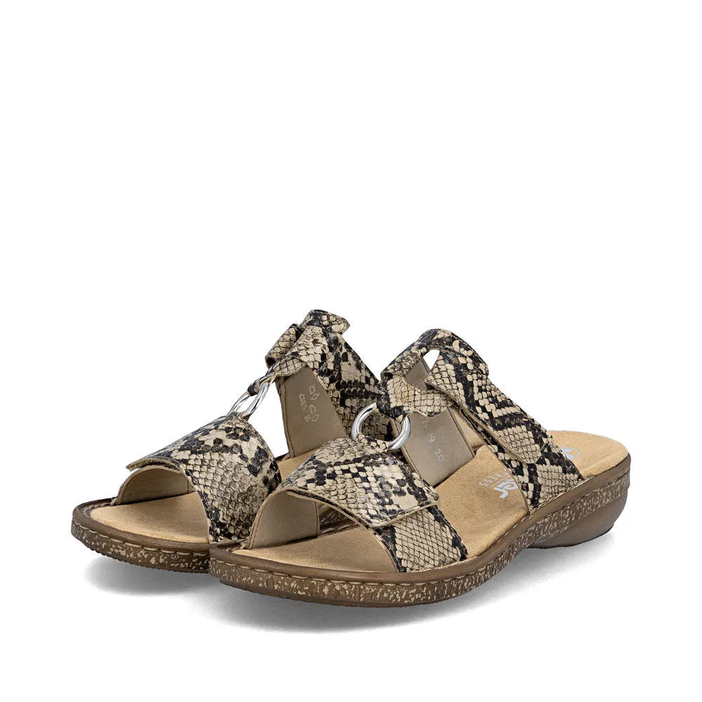 Rieker 628P9-20 women's brown slip-on mule sandals with snake print straps and a cushioned sole.