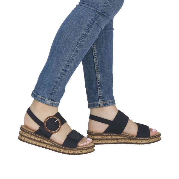 Rieker 62950-14 ladies Pacific blue touch fastening sandals with cork wedge sole and adjustable strap.