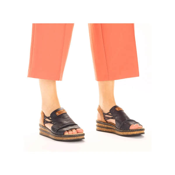 Rieker 62962-14 women's elasticated sandals in Pacific Blue and brown with wedge soles and open toes.