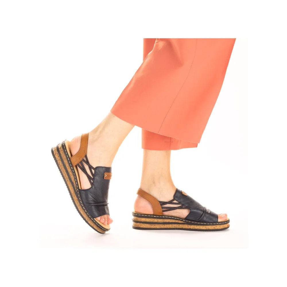 Rieker 62962-14 ladies elasticated Pacific Blue and brown sandals with cork wedge soles and open toes.
