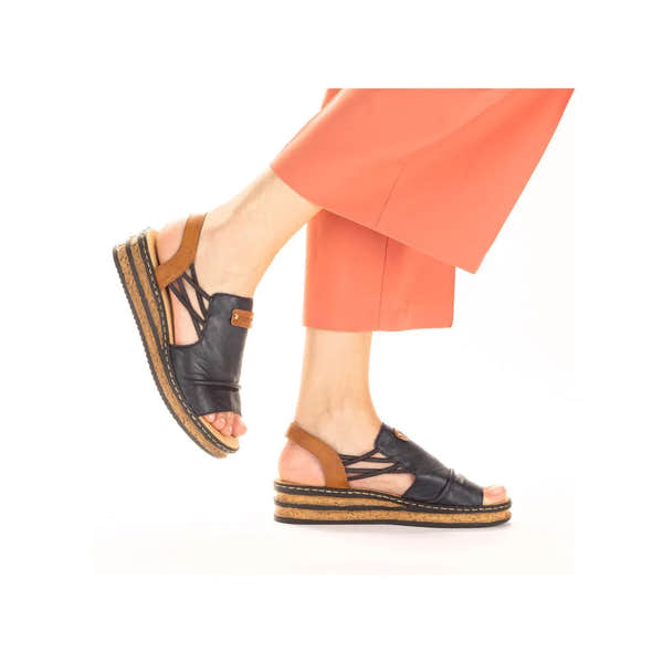 Rieker 62962-14 women's elasticated sandals in Pacific Blue and Brown with open toe, leather straps, and cork sole.