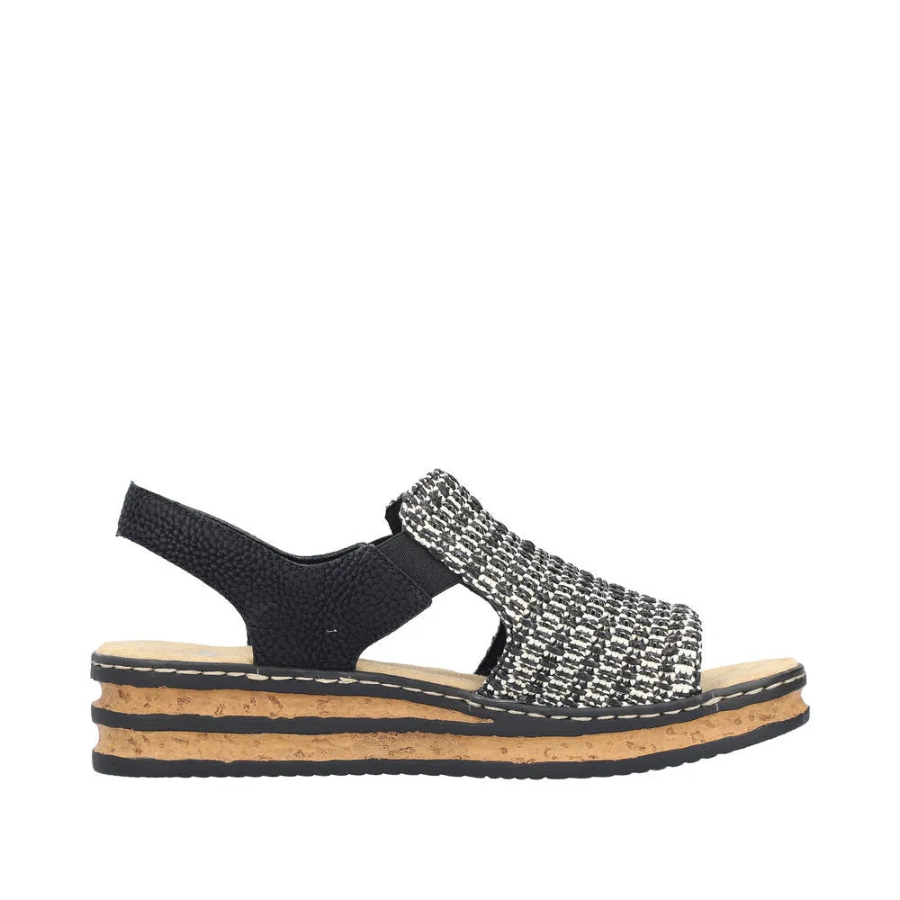Rieker 62971-00 women's black textile elasticated casual sandals with cork sole and strap detail.