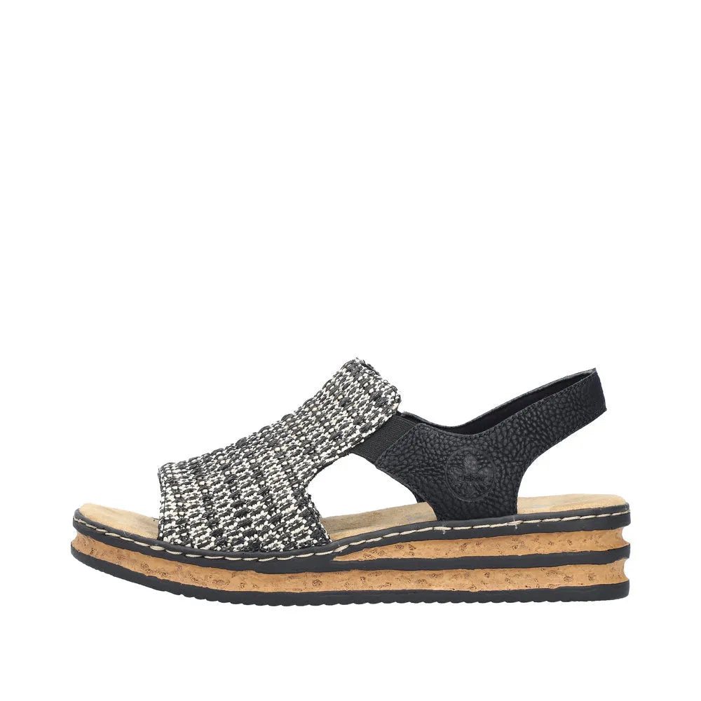 Rieker 62971-00 ladies black textile elasticated slingback sandals with stacked cork wedge sole.
