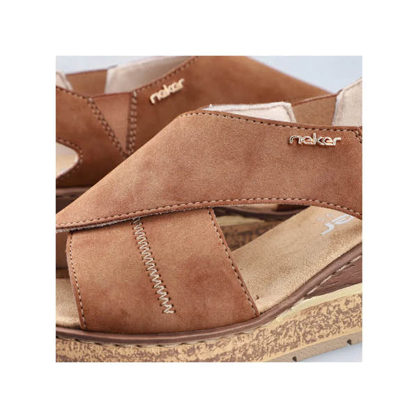 Rieker 63782-24 women's brown elasticated slip-on sandals with cushioned footbed and textured sole.
