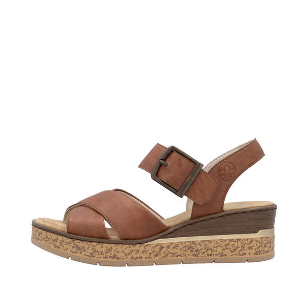 Rieker 63795-22 ladies cognac buckle sandal with faux leather straps and cushioned sole, wedge heel, and textured rubber outsole.