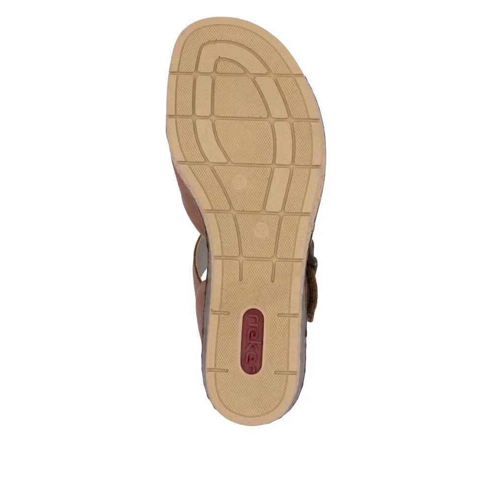 Rieker 63795-22 women's cognac buckle sandals with a beige rubber sole and adjustable strap.