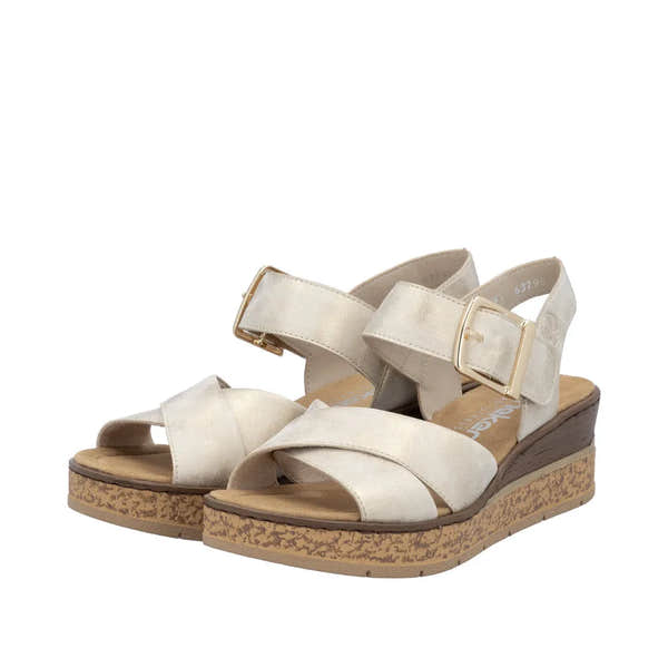Rieker 63795-60 women's beige muschel buckle sandals with adjustable straps and cork-foamed wedge heel.