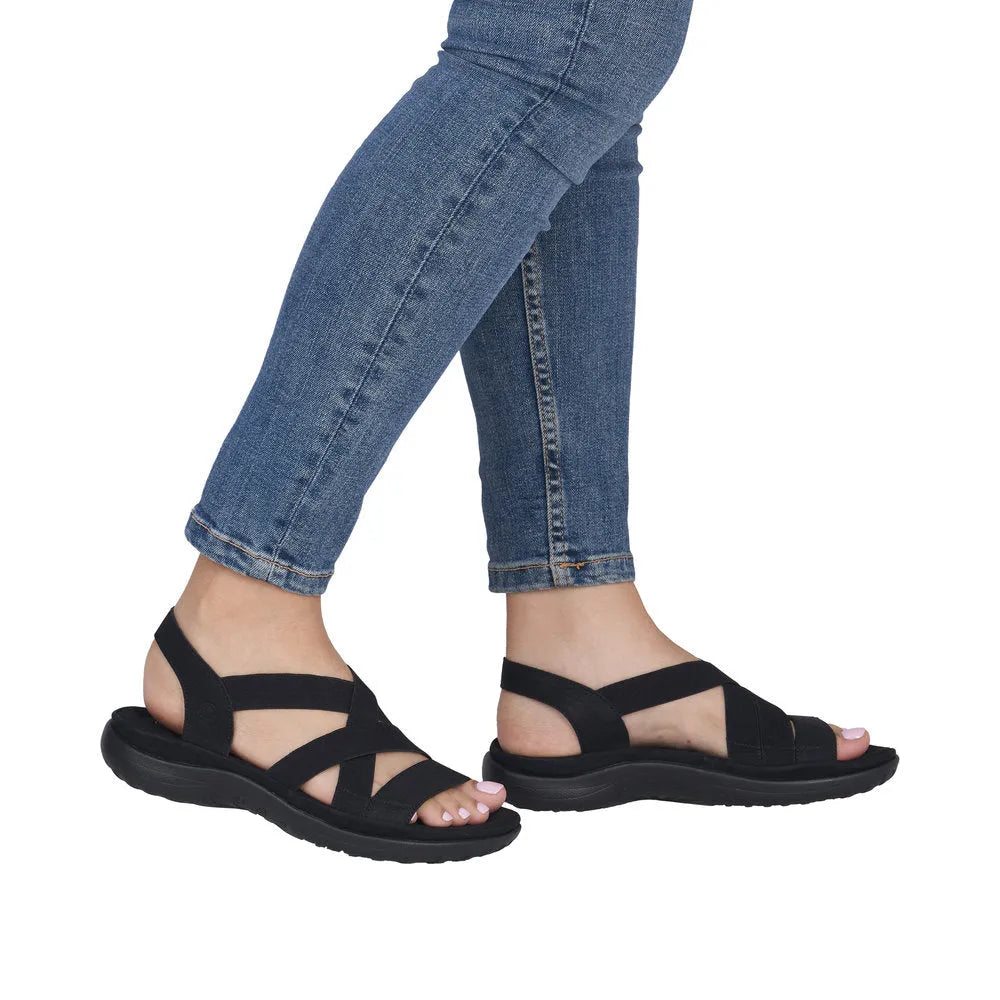 Rieker 64857-00 women's black elasticated sandals with adjustable straps and cushioned sole, perfect for summer wear.