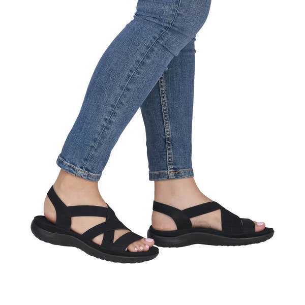 Rieker 64857-00 women's black elasticated sandals with adjustable straps and cushioned sole, perfect for summer wear.
