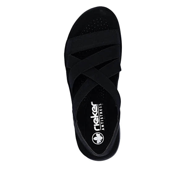 Rieker 64857-00 women's black elasticated slip-on sandals with crisscross straps and cushioned footbed.