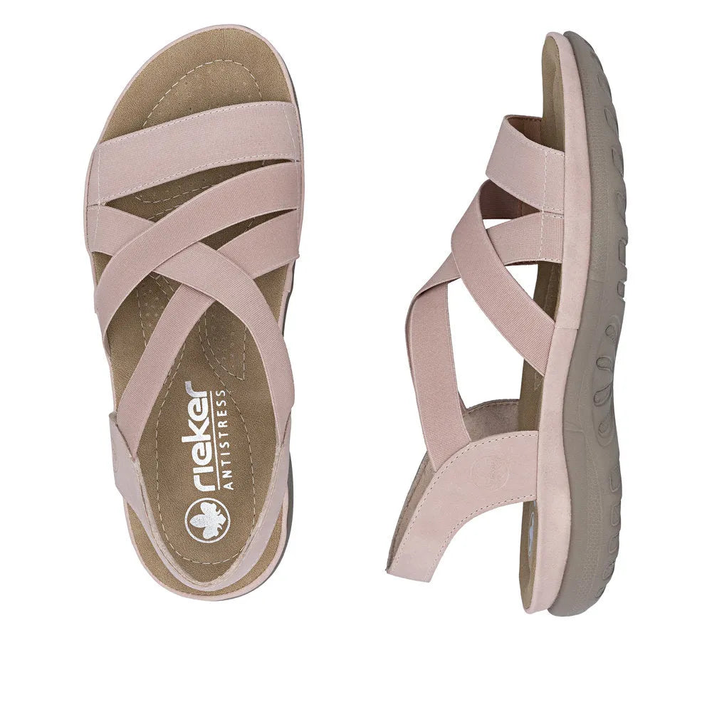Rieker 64857-31 women's light rose elasticated sandals with crisscross straps and cushioned sole.