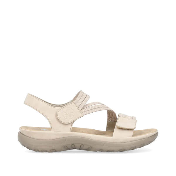 Beige and white Rieker touch fastening sandals with elastic straps and cushioned soles, ideal for comfort and style.
