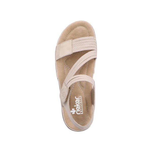 Beige and white touch fastening sandals featuring a cushioned footbed and X-pattern straps for comfort and style.
