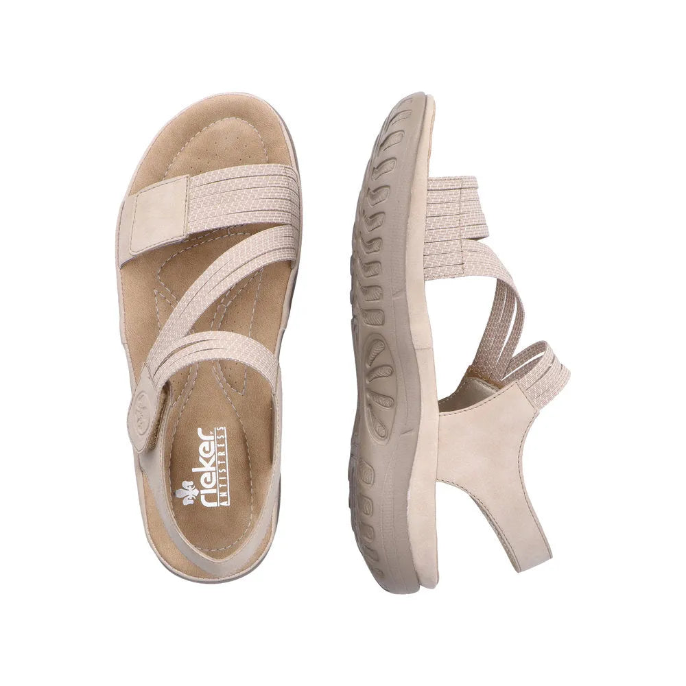Rieker 64870-62 beige/white touch fastening sandals with cushioned insole and textured straps, angled view.