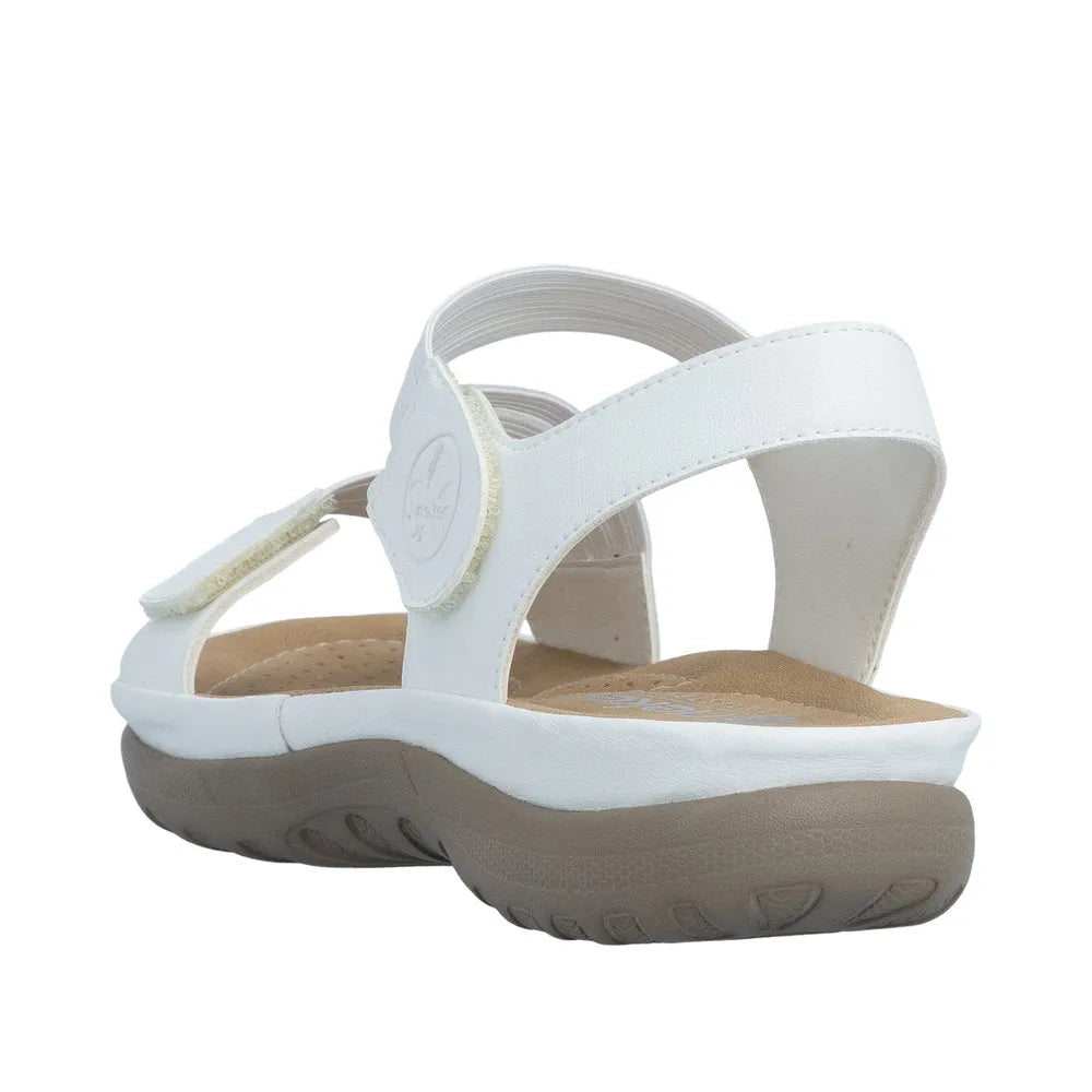 White leather slip-on sandal with touch fastenings, cushioned insole, and chunky rubber sole.
