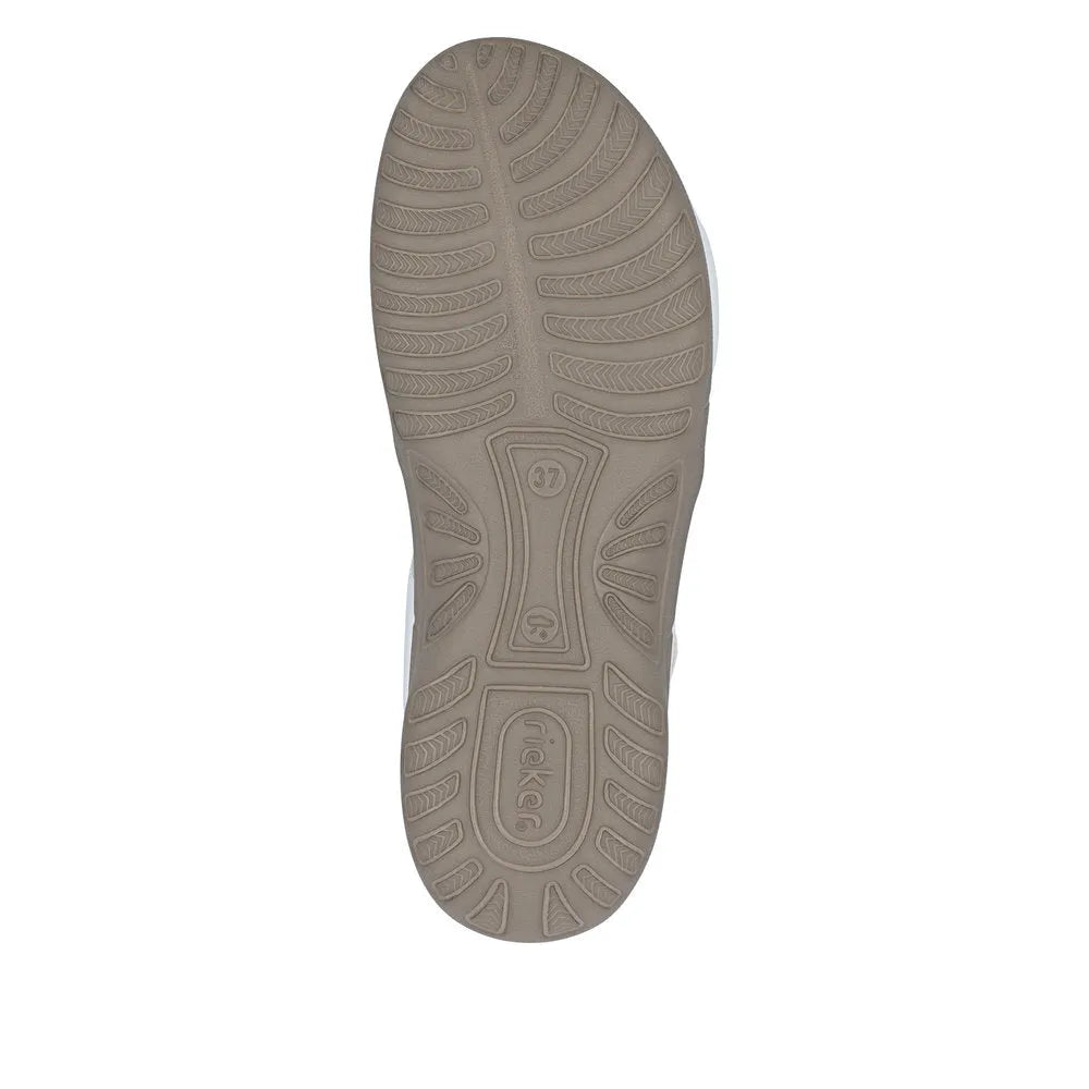 White touch fastening sandals from Rieker with a textured beige sole, designed for comfort and style.