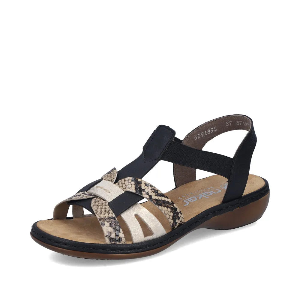 Rieker 65918-92 women's black touch fastening sandals with snakeskin and beige straps, cushioned footbed, and low wedge heel.
