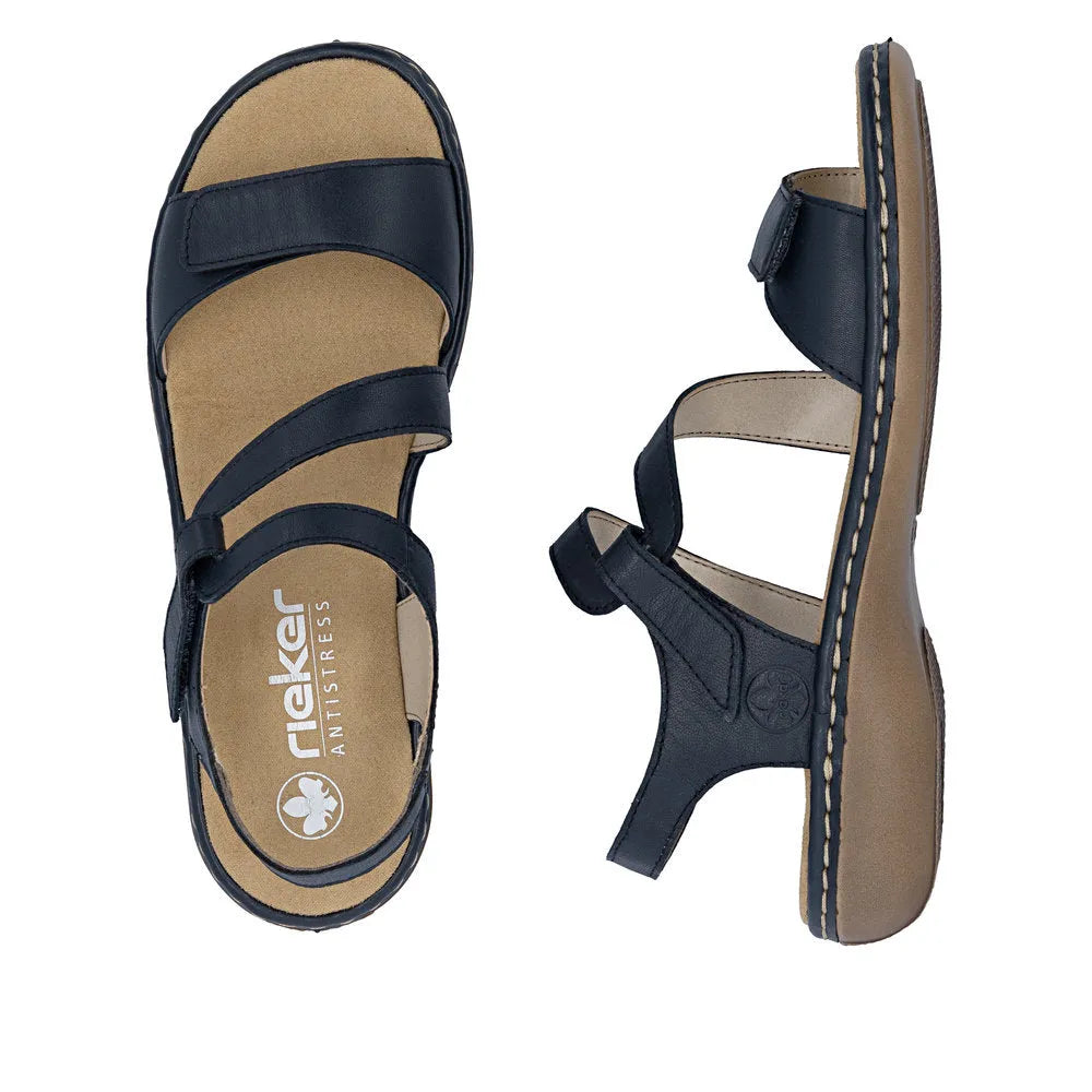 Rieker 659C7-16 navy leather touch fastening ladies sandals with cushioned beige insoles and sturdy rubber soles.