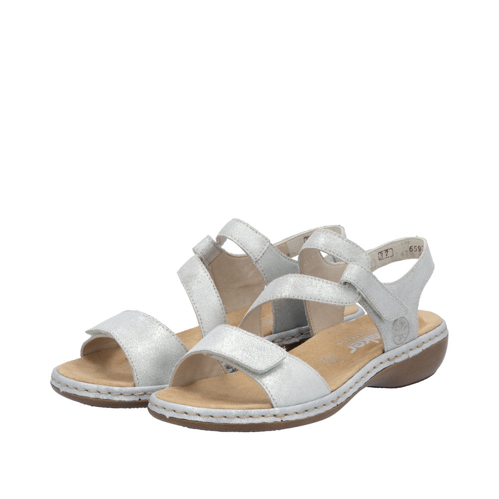 Rieker 659C7-93 ladies silver leather touch fastening sandals with cushioned footbed and low heel.