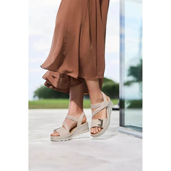 Rieker 67410-62 beige touch fastening ladies' sandals with chunky sole and adjustable straps.
