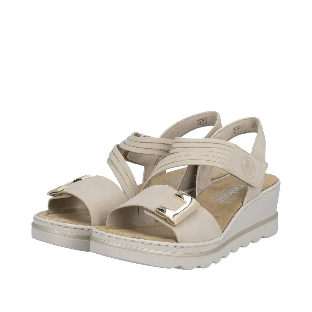 Rieker 67410-62 women's beige touch fastening sandals with buckle detail, cushioned insole, and wedge sole.