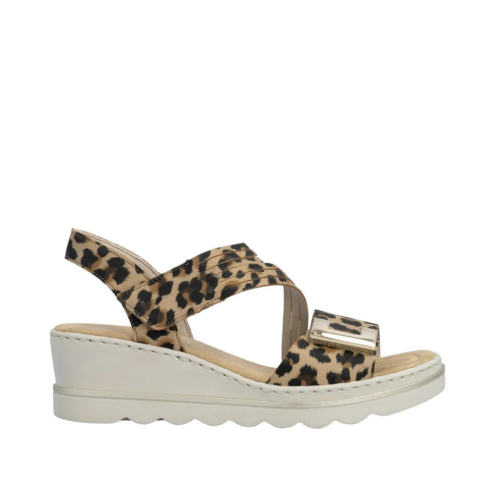 Rieker 67410-90 women's animal print touch fastening sandals with cushioned sole and chunky white wedge heel.