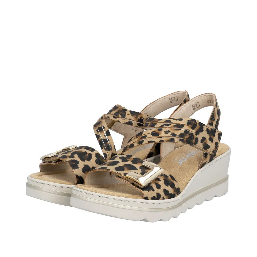 Rieker 67410-90 women's animal print touch fastening wedge sandals with buckles and cushioned sole.