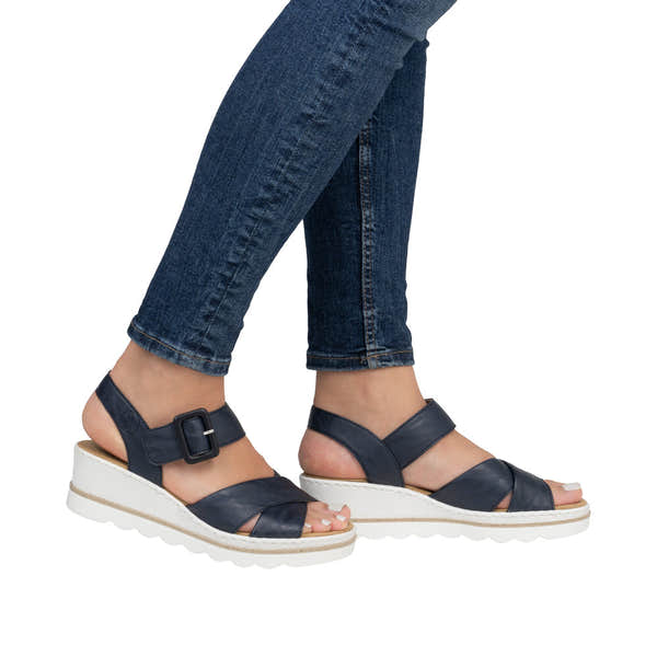 Rieker 67463-14 Ladies Pacific Buckle Sandals, navy leather straps, white wedge sole, open-toe design.