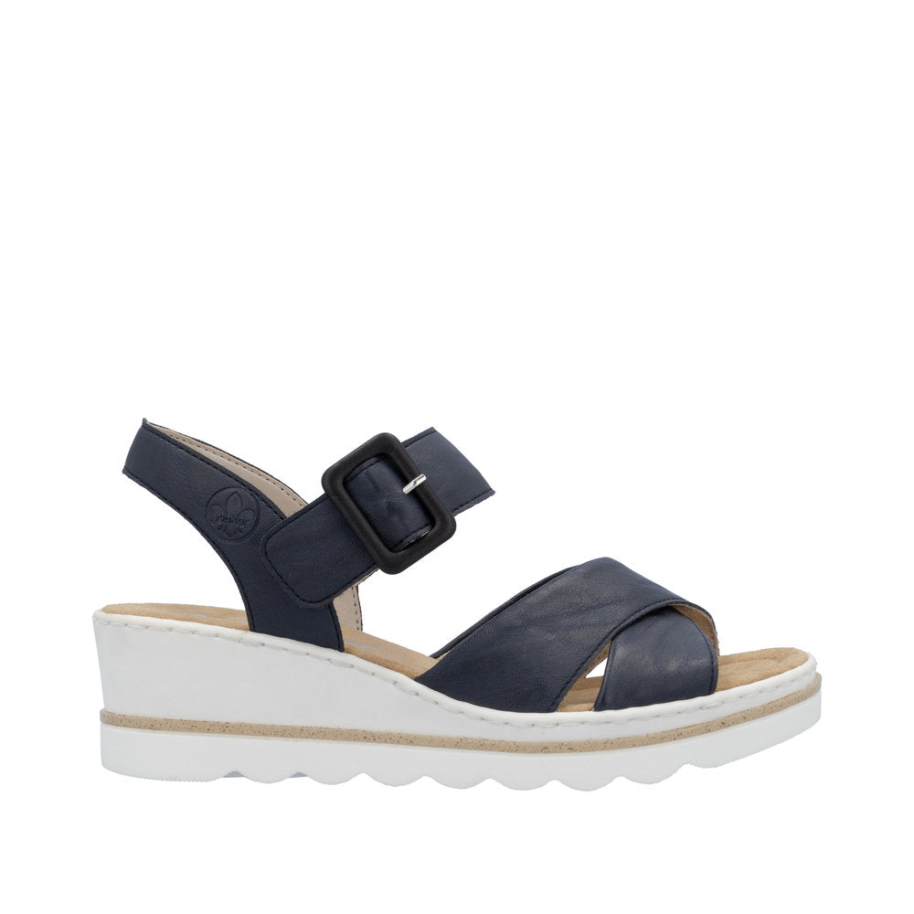 Rieker 67463-14 women's navy blue Pacific buckle wedge sandals with adjustable strap and white rubber sole.