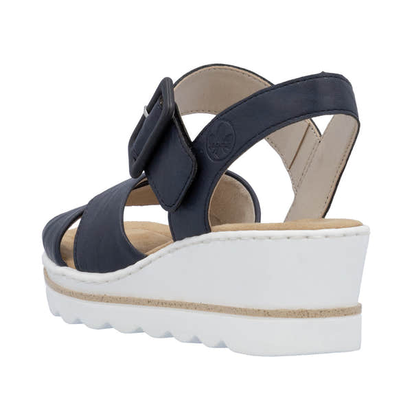 Rieker 67463-14 women's navy blue wedge sandals with buckle closure, cushioned insole, and white platform sole.