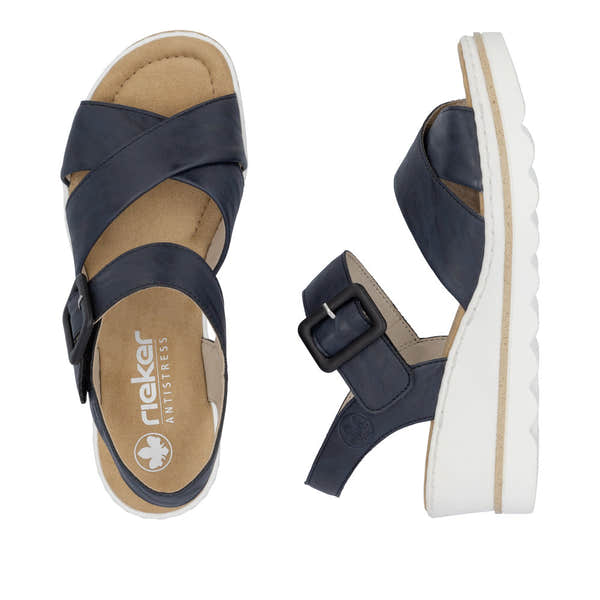 Rieker 67463-14 Ladies Pacific Buckle Sandals with navy straps, cushioned beige footbed, and white platform sole.
