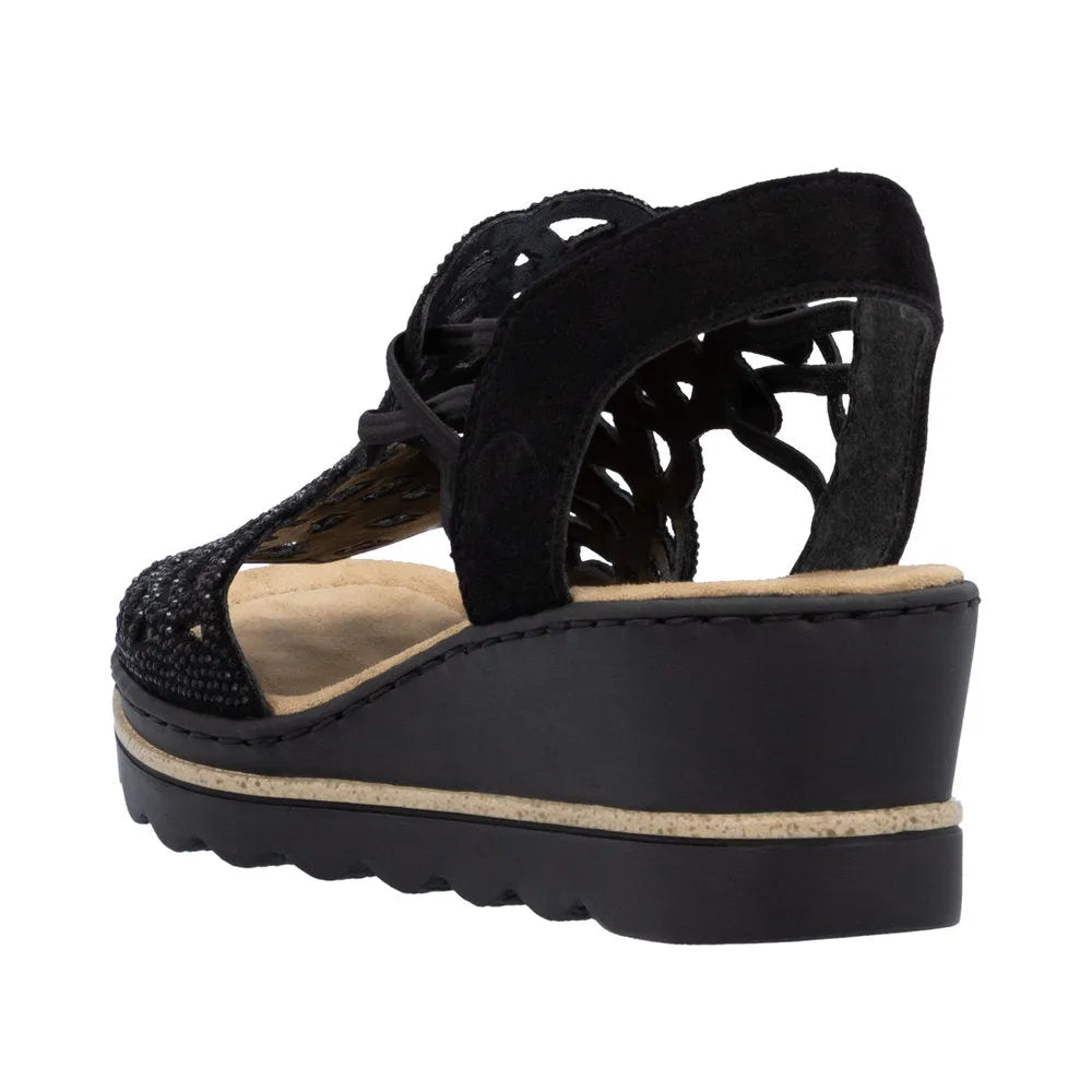Rieker 67465-00 women's black textile elasticated wedge sandals with cutout design and ergonomic footbed.
