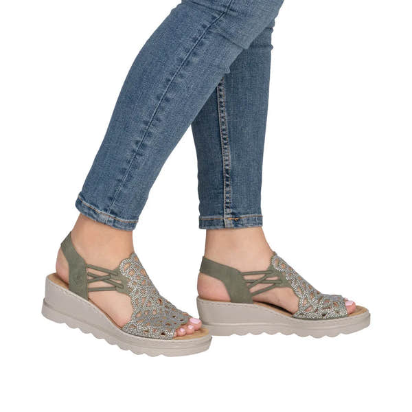 Rieker 67465-52 women's grey elasticated slip-on sandals with cutout design and thick rubber sole.