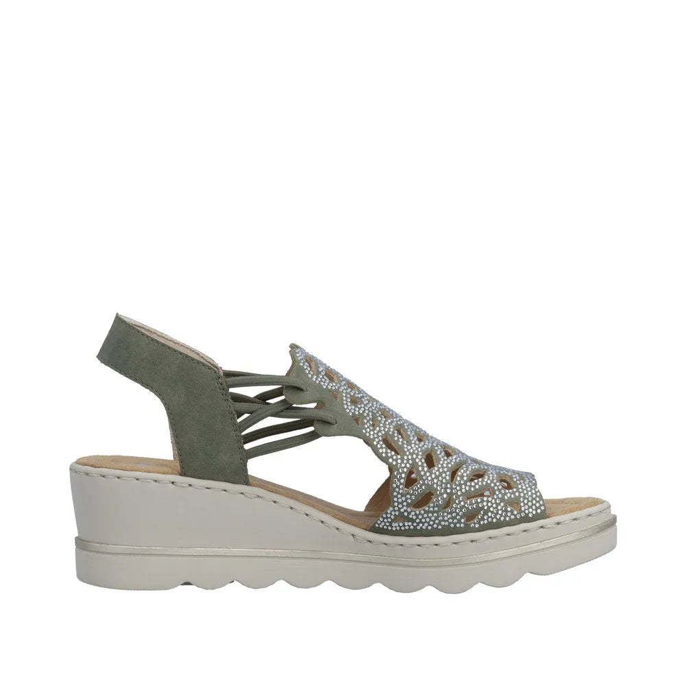 Rieker 67465-52 women's grey elasticated wedge sandals with decorative cutouts and rhinestone accents, cushioned sole, and adjustable heel strap.