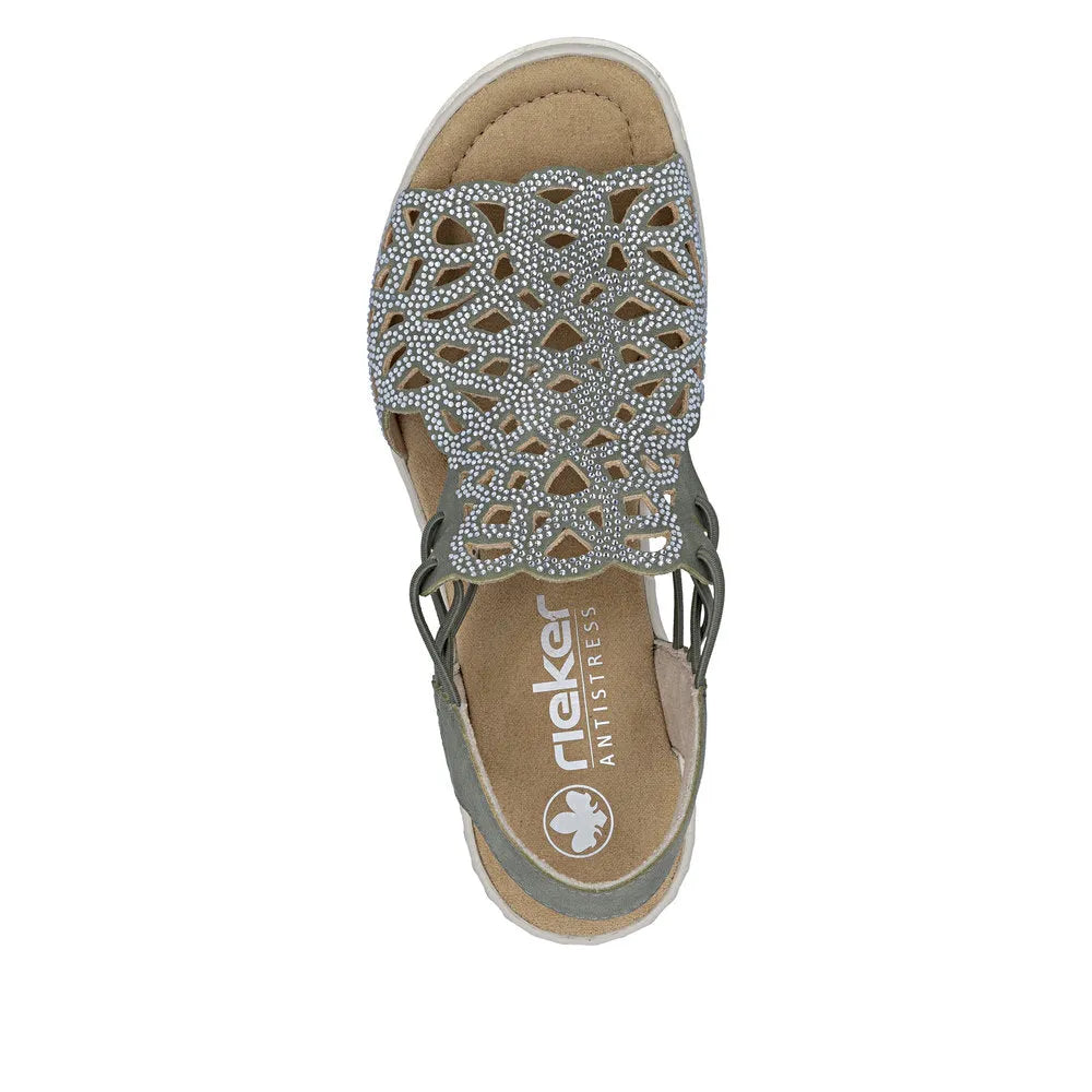 Rieker 67465-52 ladies grey elasticated sandal with ventilated cut-out design and rhinestone embellishments.