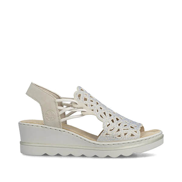 Rieker 67465-62 beige elasticated ladies' wedge sandals with cutout design and rhinestone embellishments.