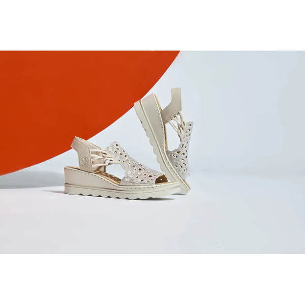 Rieker 67465-62 ladies beige elasticated sandals with cut-out design and chunky sole.