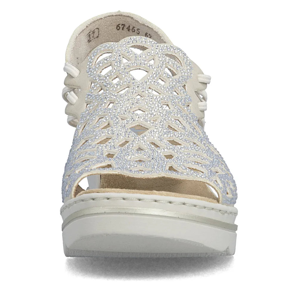 Rieker 67465-62 beige ladies elasticated sandals with intricate cut-out design and rhinestone embellishments.