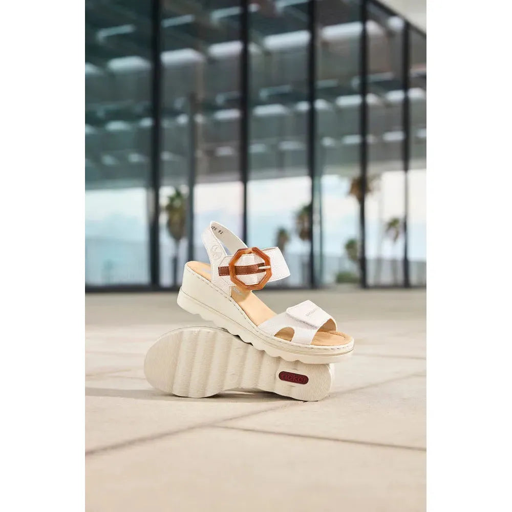 Rieker 67476-91 ladies off-white touch fastening sandals with chunky sole, open toe, and adjustable buckle strap.